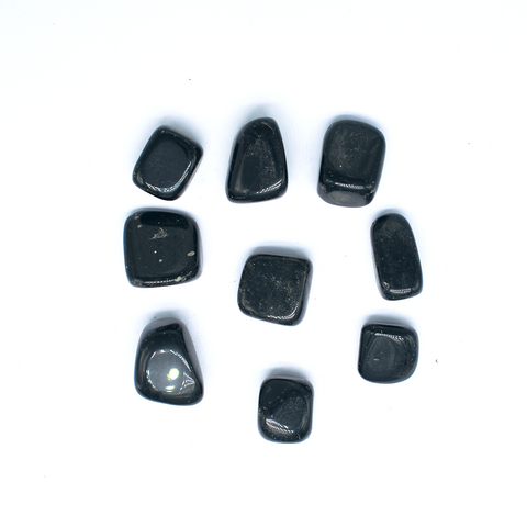 Black obsidian tumbles Black obsidian tumbles