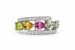 Natural tourmaline ring with pear-cut stones and american diamond bands