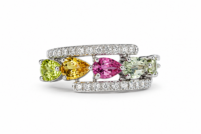 Natural tourmaline ring with pear-cut stones and american diamond bands