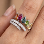 Macro close-up of pear-cut natural tourmalines and CZ pave detail on sterling silver ring
