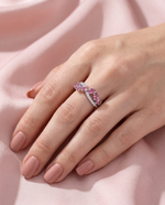 Close-up of hand wearing natural pink tourmaline ring