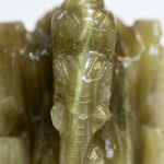 Close-up of natural cat's eye Ganesha showing chatoyant sheen