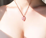 Rose quartz heart pendant, close-up of polished stone – Gift Palace India