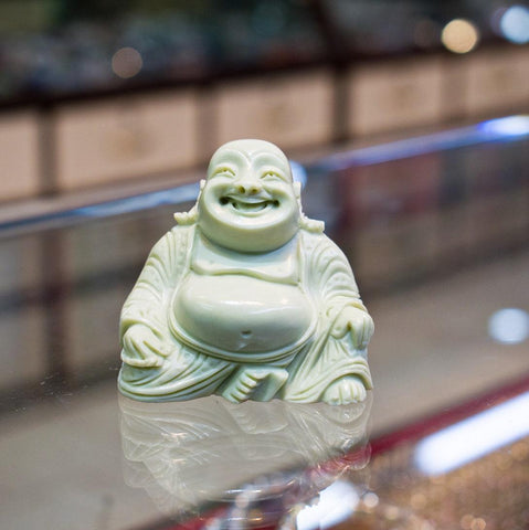 Serpentine Laughing Budha